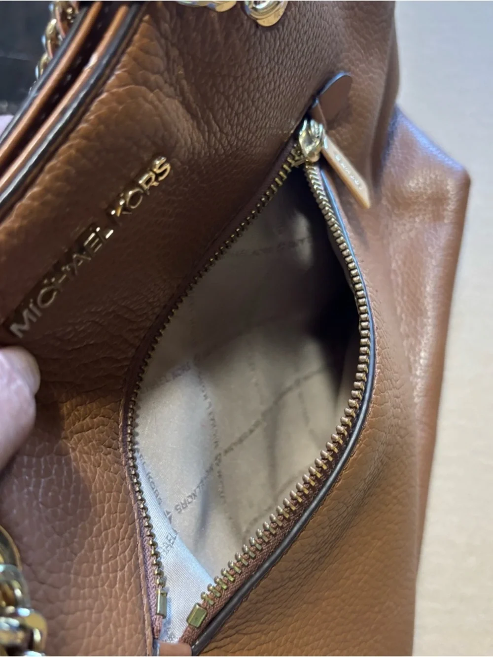 Michael Kors Cognac Pebbled Leather Tote with Gold Chain Straps zipper closure